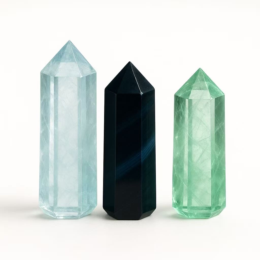aquamarine, blue tiger’s eye (Hawk’s Eye), and green fluorite gemstones for balance and peace
